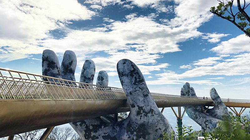 Two gigantic hands hold the Golden Bridge in Vietnam