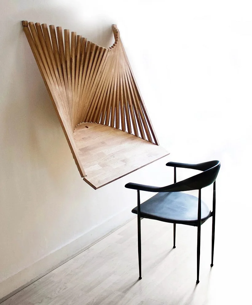 Robert van Embricqs is passionate about multifunctional furniture and he designed a desk called flow wall desk which is considered a piece of art as well.