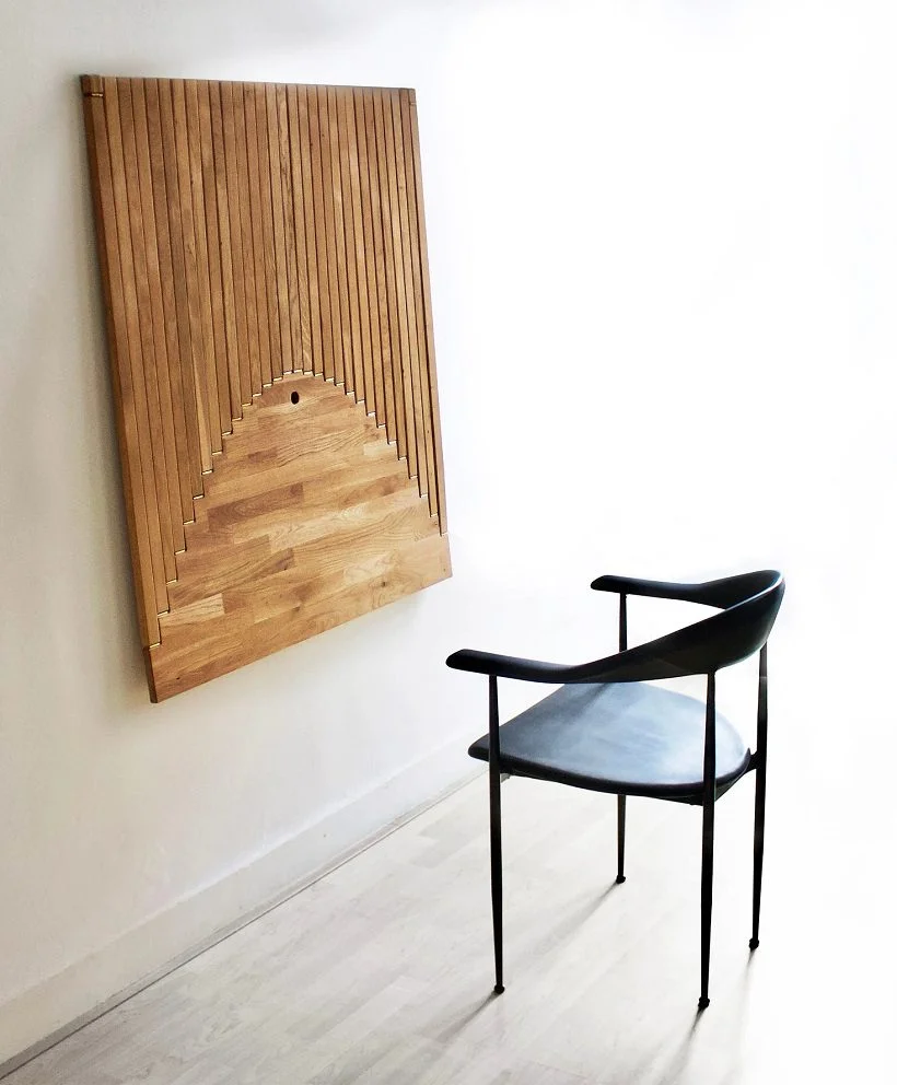 Robert van Embricqs is passionate about multifunctional furniture and he designed a desk called flow wall desk which is considered a piece of art as well.