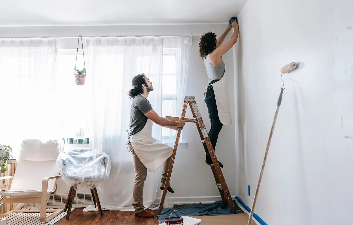 couple painting walls