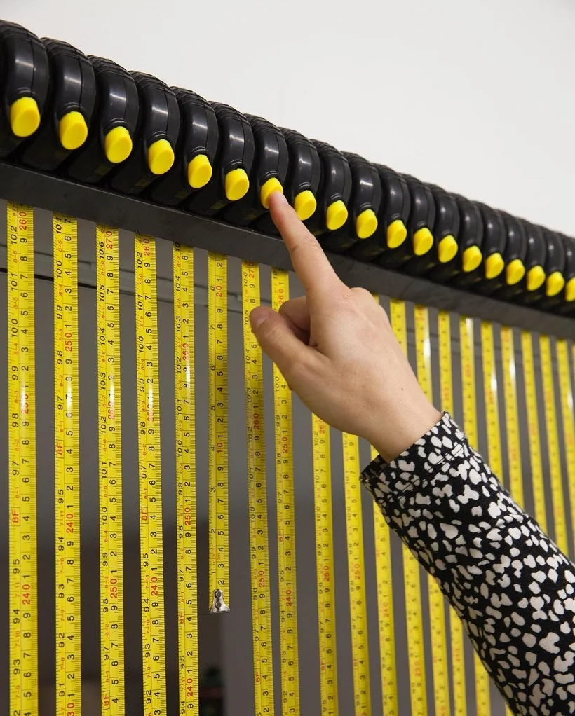 button of tape measure