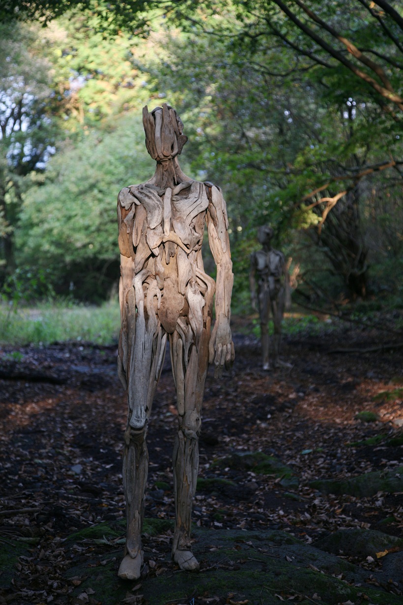 a sculpture in the forest