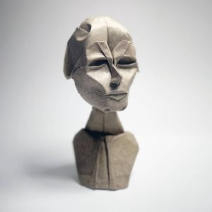 a paper sculpture of a woman