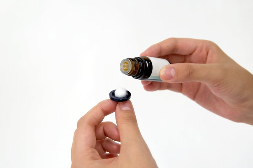 dropping essential oil