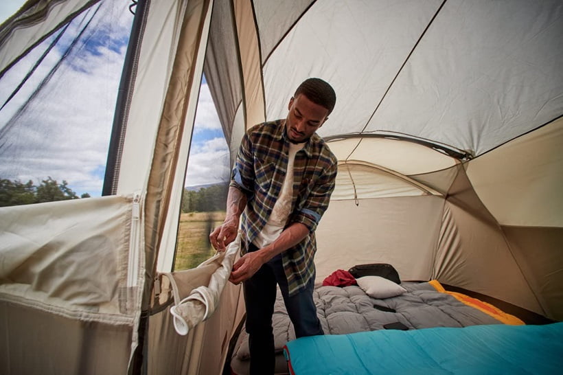 a man in a tent