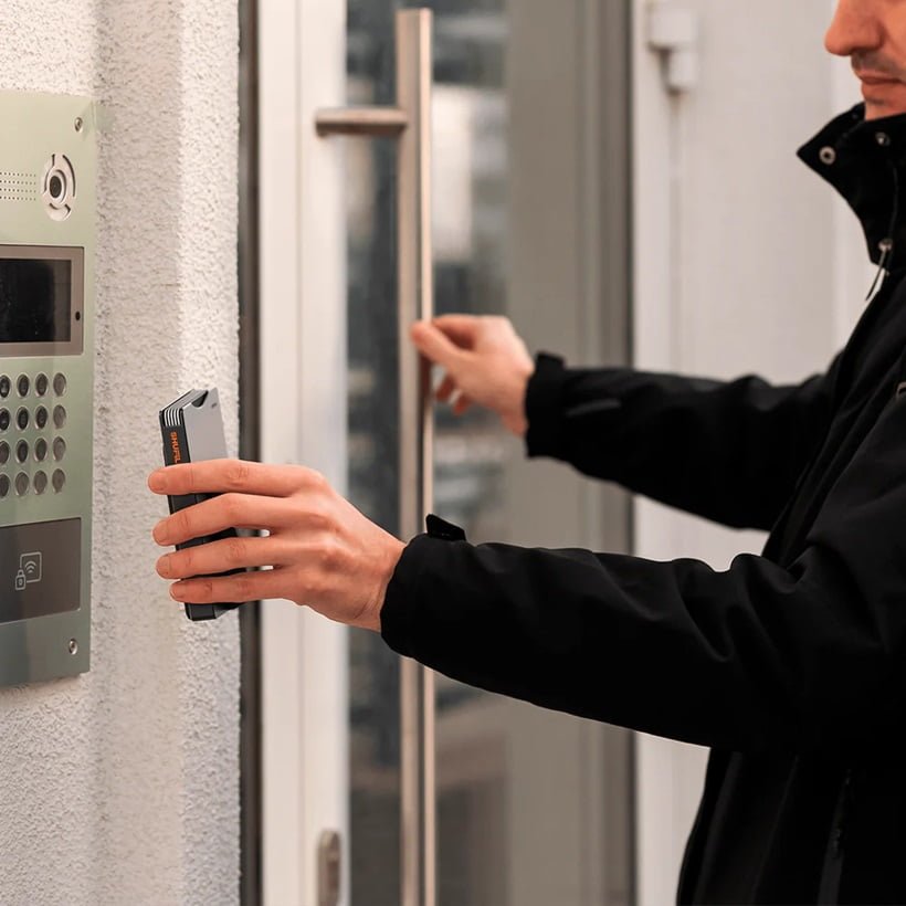 a man opening a dor with NFD chip