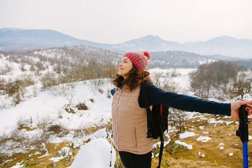woman greeting the nature and sky