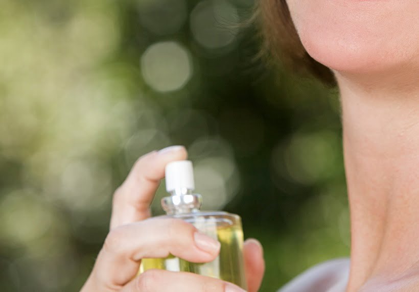 a woman wearing perfume