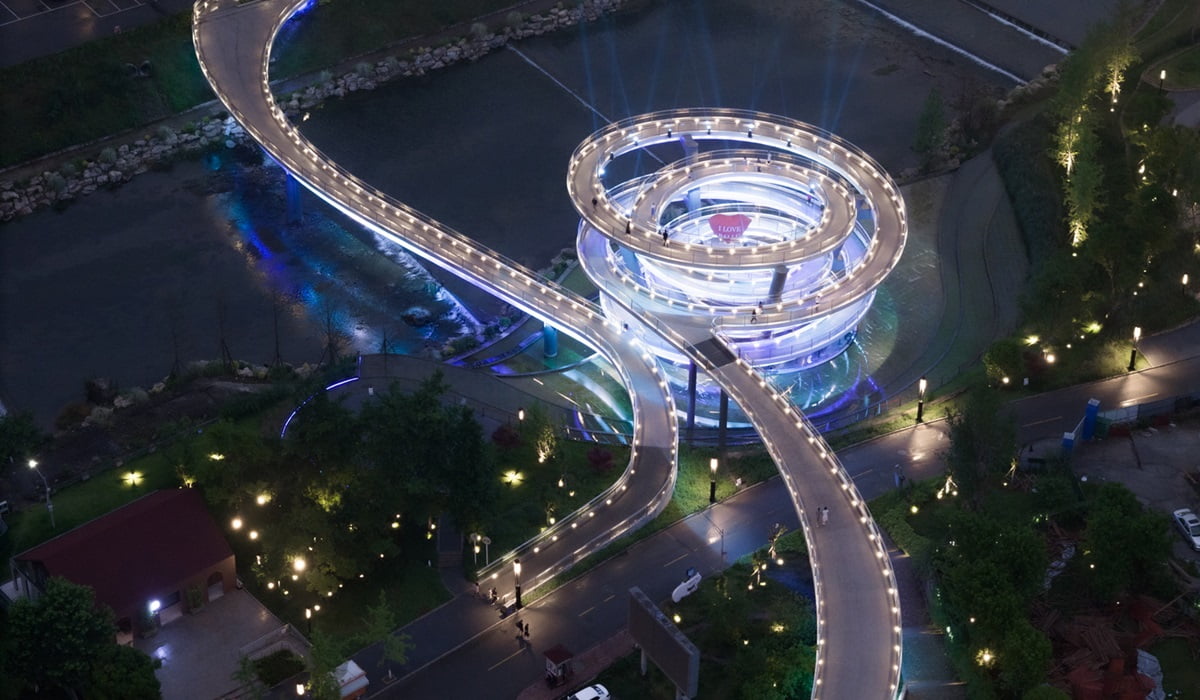 The G-clef bridge is a stunning architectural marvel designed by ZZHK Architects. The bridge stands as a symbol of creativity and innovation.