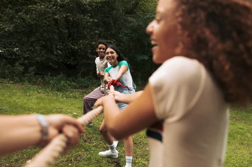 teenagers having fun during camping