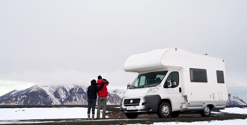 couple travelling with an RV in winter