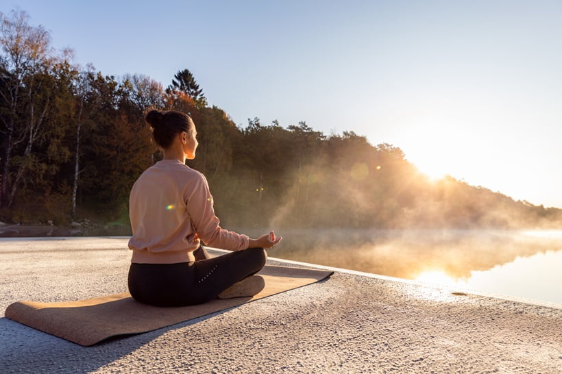 woman doing breathing exercise