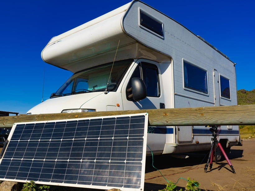 a solar panel in front of an RV