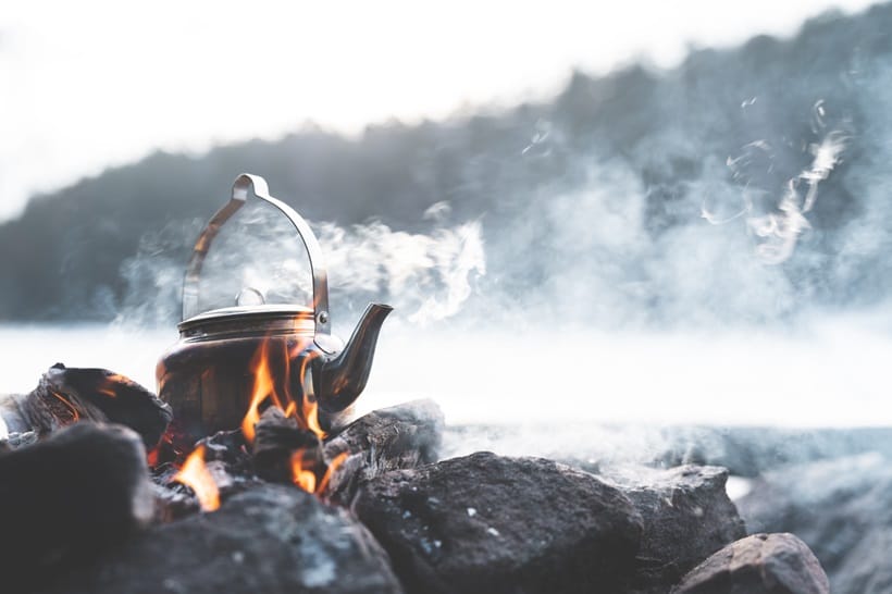 boiling water on camping fire
