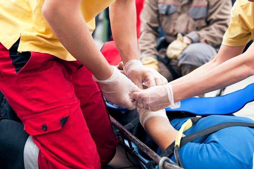 paramedics performing first aid