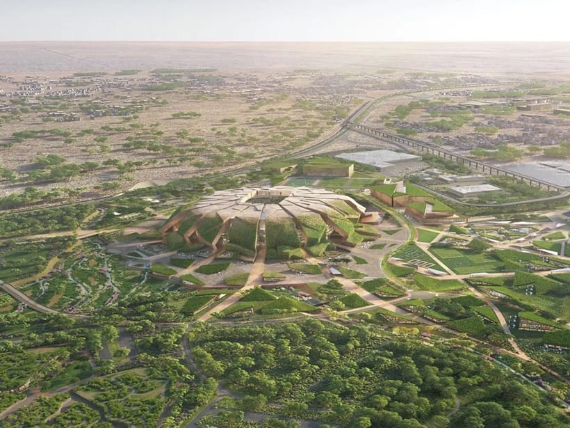 green city alongside of a desert