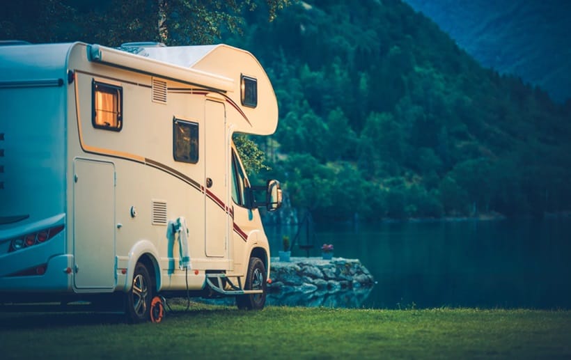 RV parked near lake