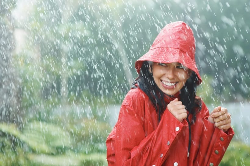 a camper in her rain jacket