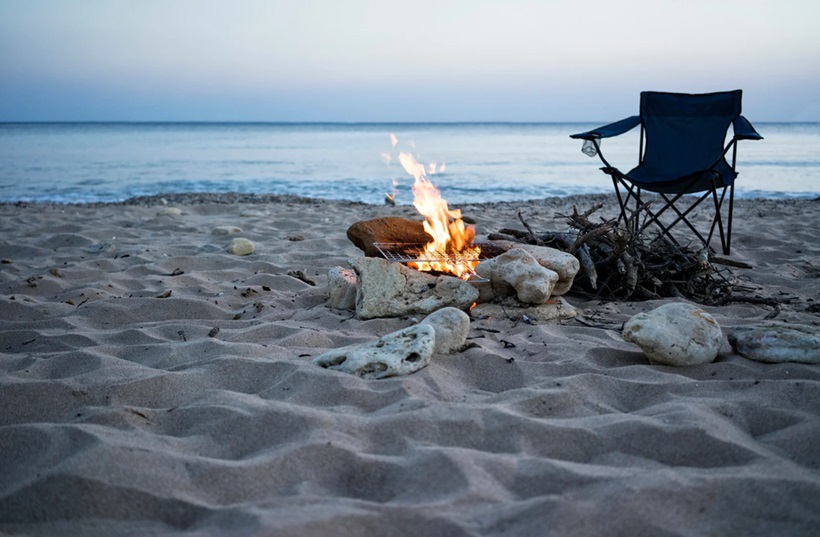 camp chair and fire