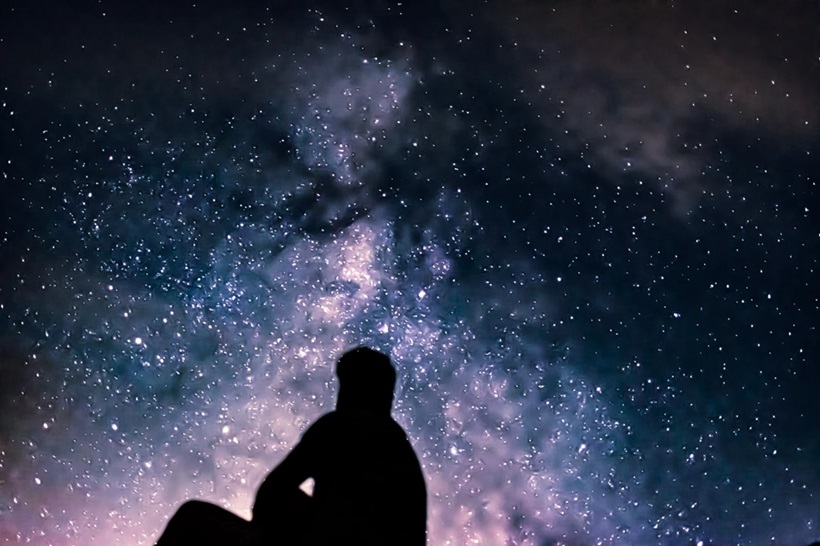 a man watching the sky