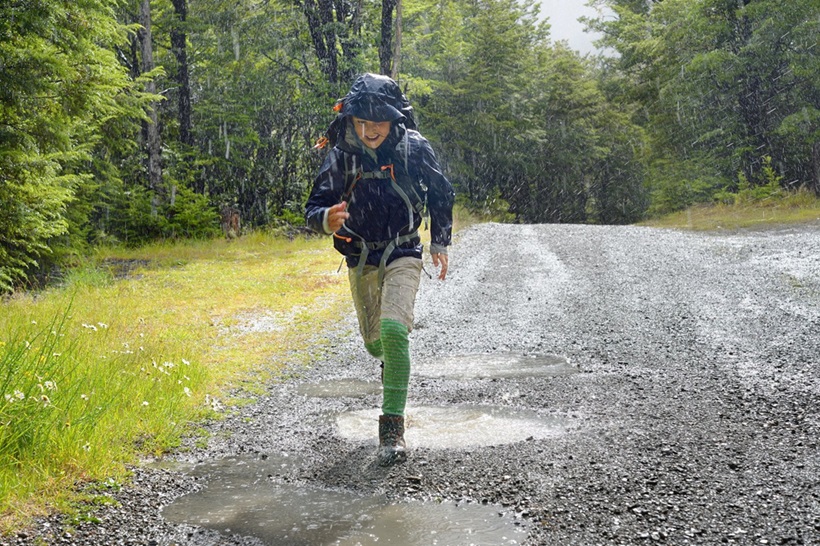 a child running in the rain