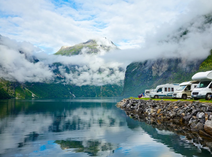 RVs parked near lake