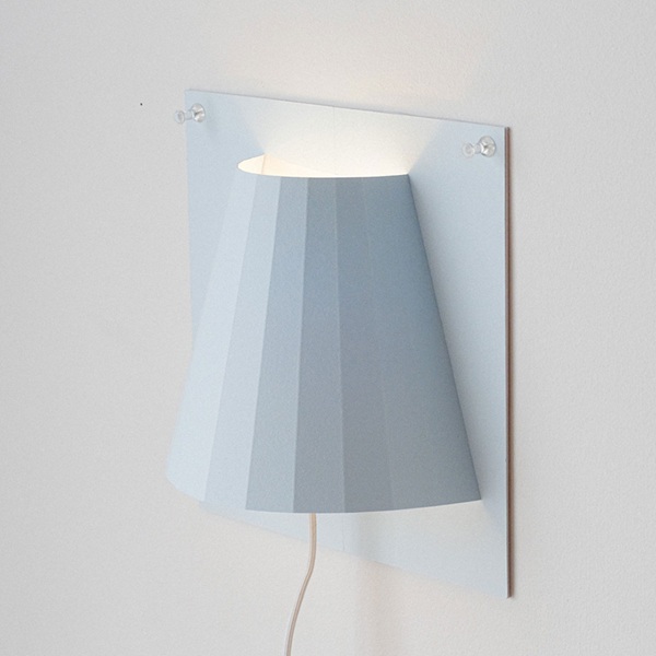 The innovative designer Maxwell Sims designed a perfect blend of modern design and practicality with the Pin Sconce lighting concept.